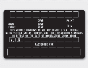 The certification label is located on the driver's door sill at the center pillar.
